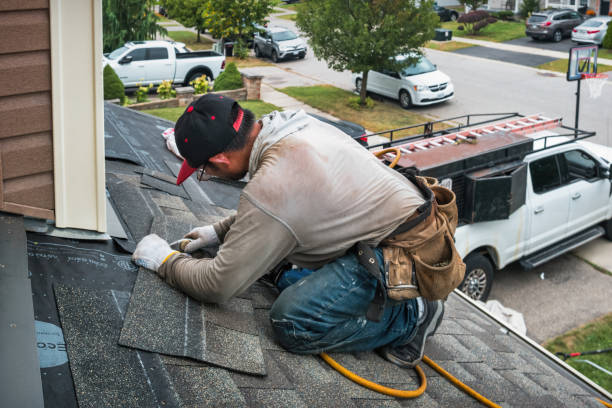 Professional Storm Damage Roof Repair technician working in Ganado, TX